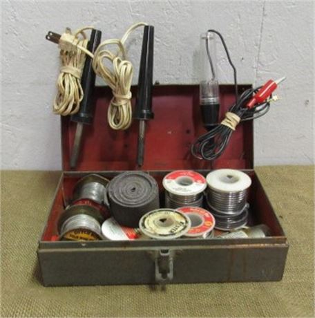 Pair of Soldering Irons w/ Solder in a Steel Box and a Circuit Tester