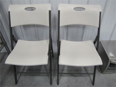2-Lifetime Folding White Chairs (711 Blackhawk St. Billings)