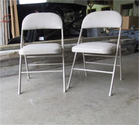 Two Upholstered Folding Metal Chairs