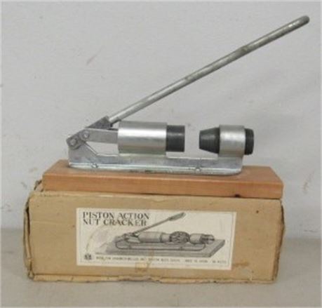 Unique Piston Action Nut Cracker