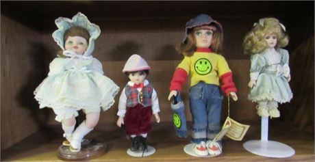 4 Collectible Dolls