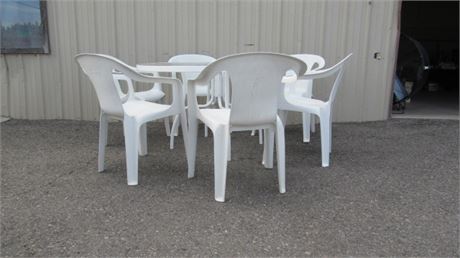 Glass Topped Patio Table w/ Six Plastic Chairs