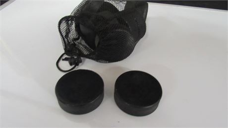 New One Dozen Hockey Pucks w/ Carry Bag