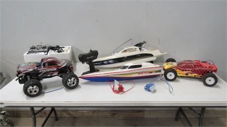 Pair of Remote Control Boats and a Pair of Remote Control Cars