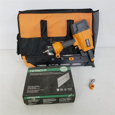 Nice Rigid Round Head Pneumatic Nailer w/ Some Nails