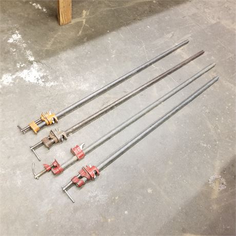 Four 42" Pipe Clamps