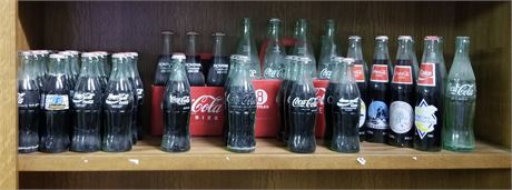 Assorted Coca-Cola Bottles