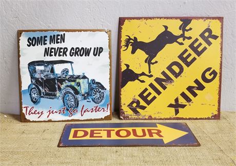 Assorted Repro Metal Signs: Reindeer Xing, Some Men Never GrowUp, & Detour