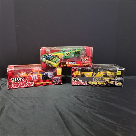 Collectible Racing Champions Die Cast Car Trio
