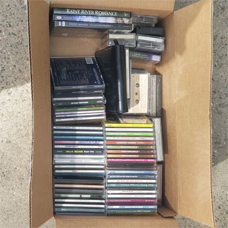 Box full of CD's, DVDs, & Cassette Tapes
