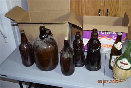 Brown glass syrup and other bottles.