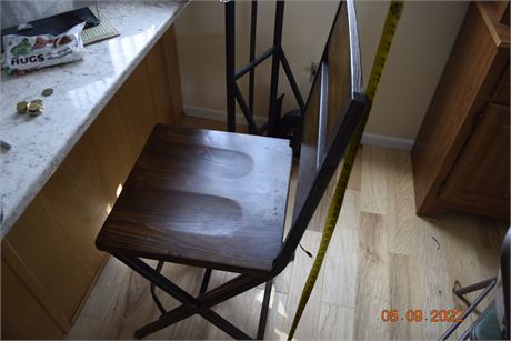 Counter height wood bar stool.