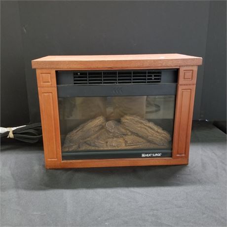 Mini Heat Surge Fireplace Heater