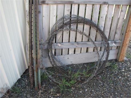 5 Steel Posts and rolls of Barb Wire