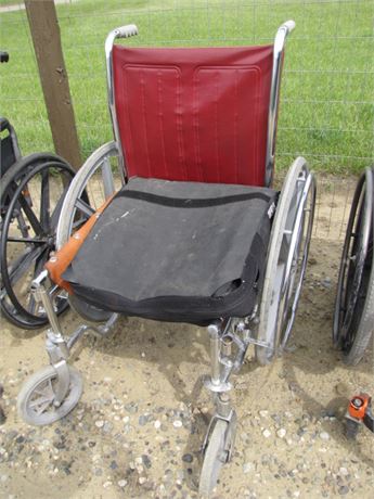 Black and Red Wheel Chair