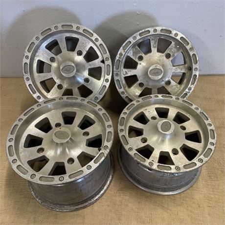 4 Polaris Wheels...2 Front-2 Rear