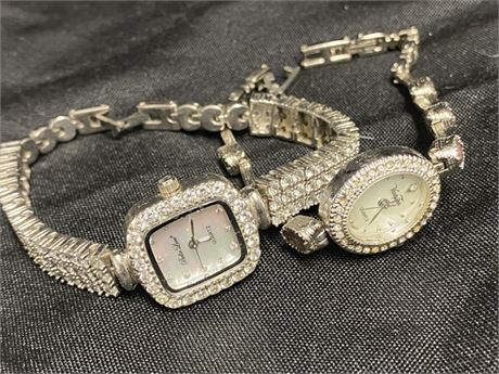 Two Stainless Steel Watches With Diamond Link Stones. Square and circle