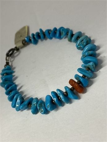 Turquoise with one red stone bracelet