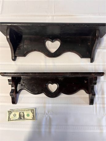 matching pair of wooden wall shelves with heart
