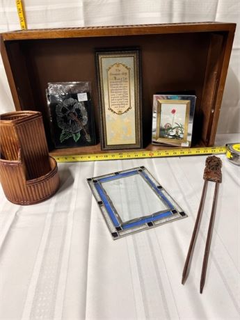 storage box with frames and art