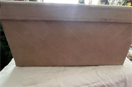 fabric in leather covered box