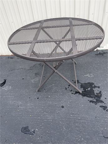 Folding metal patio table