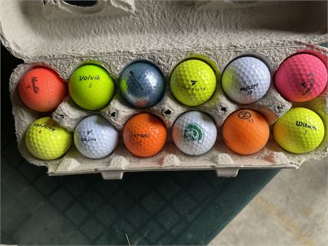 One dozen colored golf balls