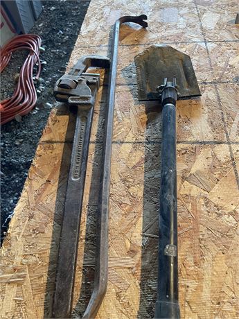 Large pipe wrench, large Crow bar and Camp Shelby