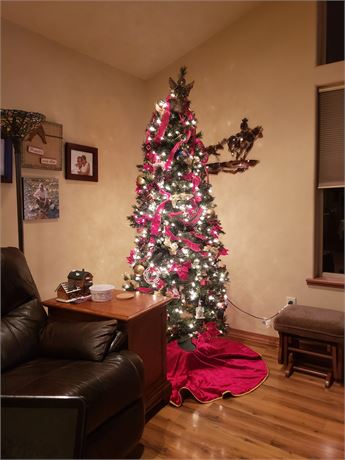 7 ft. Automatic rising pre lit Christmas tree…push the button..watch it rise
