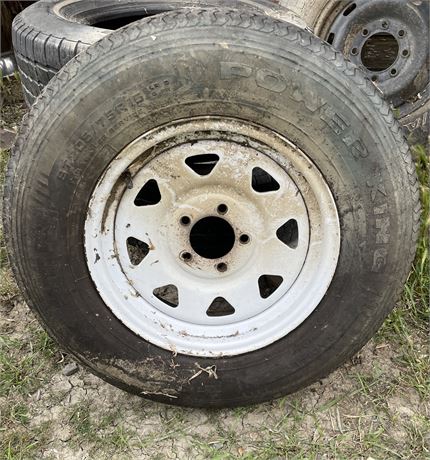 USED TIRE AND 5 HOLE WHEEL