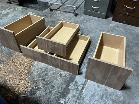 Five drawers with slides attached..