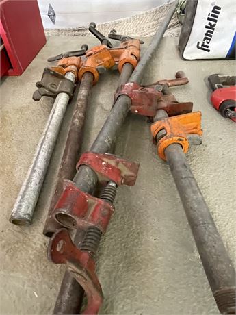 Red and Orange Pipe Clamps… Back Table