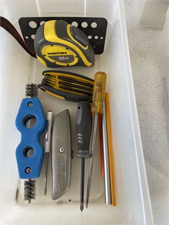 Yellow Tape Measure and Miscellaneous Tools