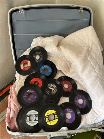 Suitcase Full of Linens and Very Old Records