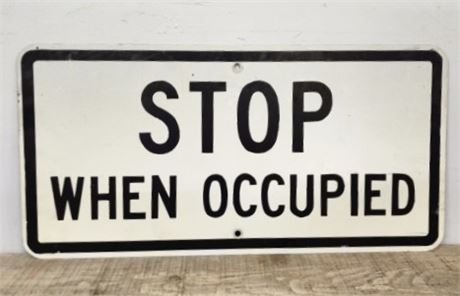 Genuine Stop When Occupied Metal Sign