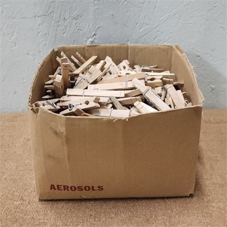 Box Full of Wooden Clothes Pins