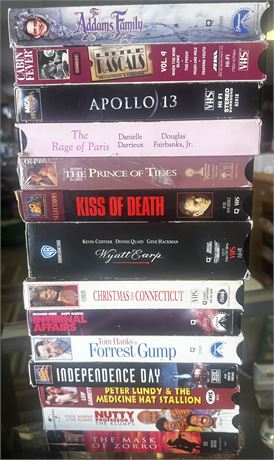 VHS Assortment includes Forrest Gump, Wyatt Earp, Addams Family