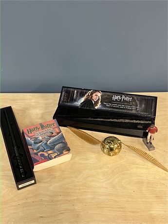 Harry Potter Book, Wands, Harry Figurine, and Golden Snitch Figurine