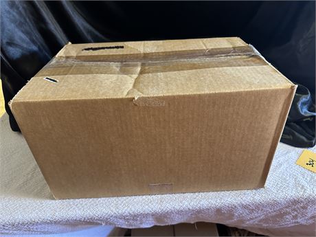 Bid on a box-Win a box. We have no clue what’s in there.