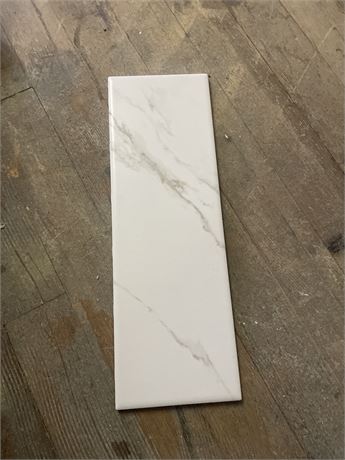 1 1/2 boxes of marble marazzi  wall tile