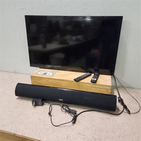 32" LCD Insignia TV w/ Sound Bar and Remotes