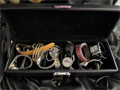 Box of watches that do not work-may just need batteries.