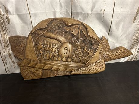 Wooden Turtle That Has An Ancient Village Of Yap Carved In It