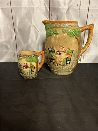 Porcelain vase and cup with villager painted scene.