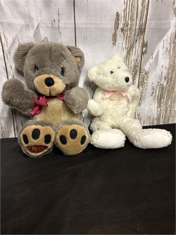 Two Cute Stuffed Bears One Is White One Is Gray And Brown