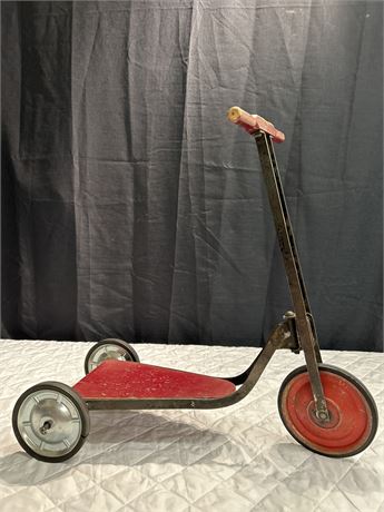 COOL LITTLE RED SCOOTER WITH THREE WHEELS !!!!