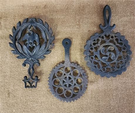 Antique Cast Iron Sad Iron Trivet Trio