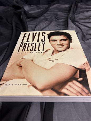 ELVIS PRESLY UNSEEN ARCHIVES BY MARIE CLYTON COPYRIGHT 2004.