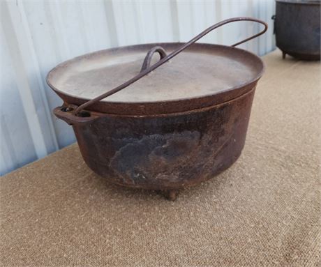 Weathered Griswold Footed Cast Iron Pot w/ Lid