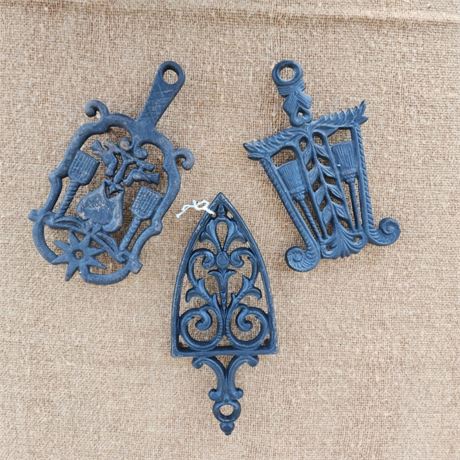 Antique Cast Iron Trivet Trio